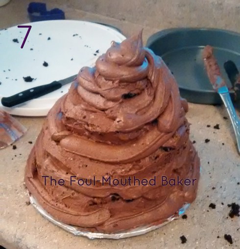 Pipe out some icing to make your cake look more shit-like. 